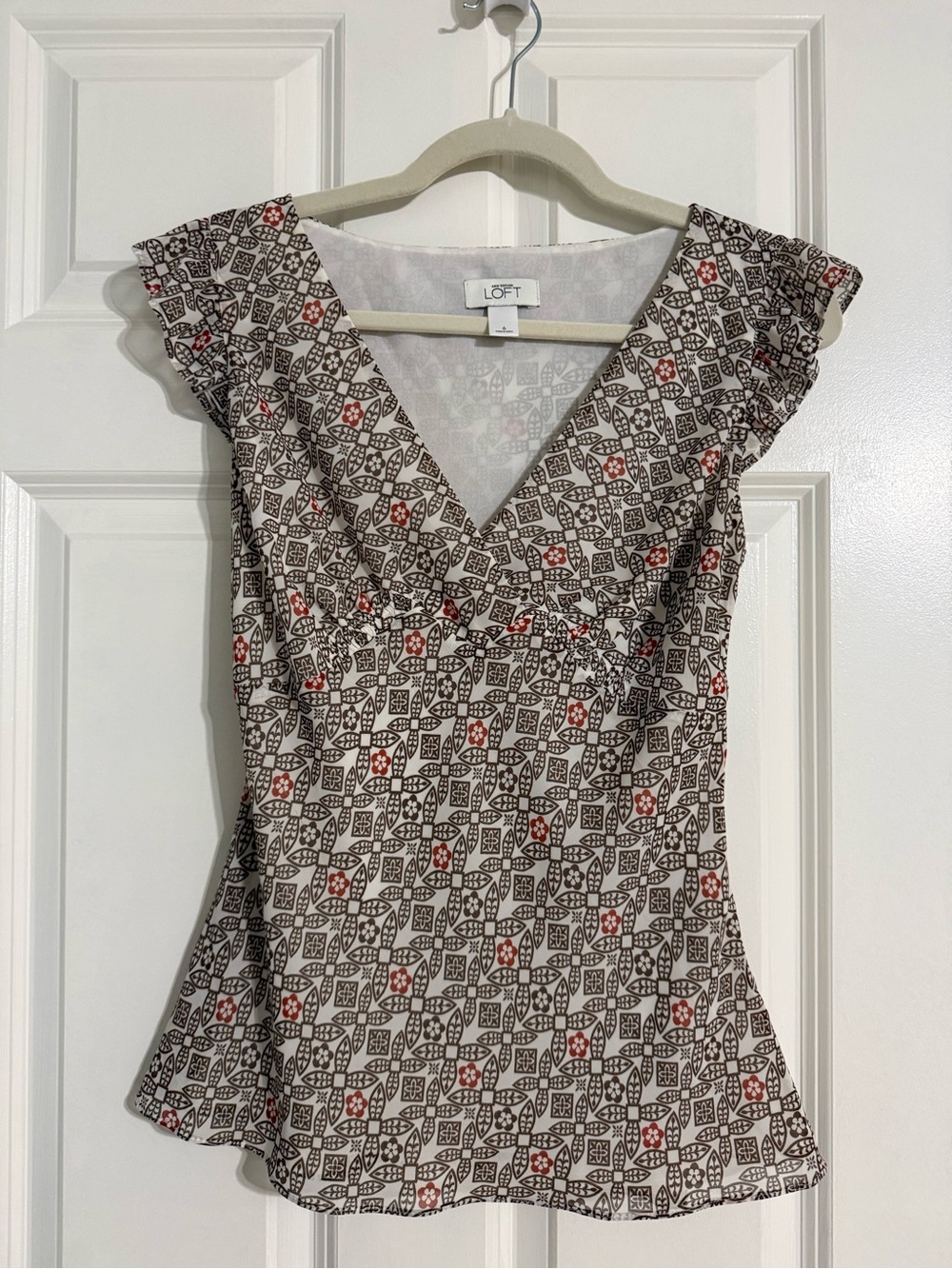 LOFT Cream and Brown Geometric V-Neck Flutter Sleeve Blouse with Red Details